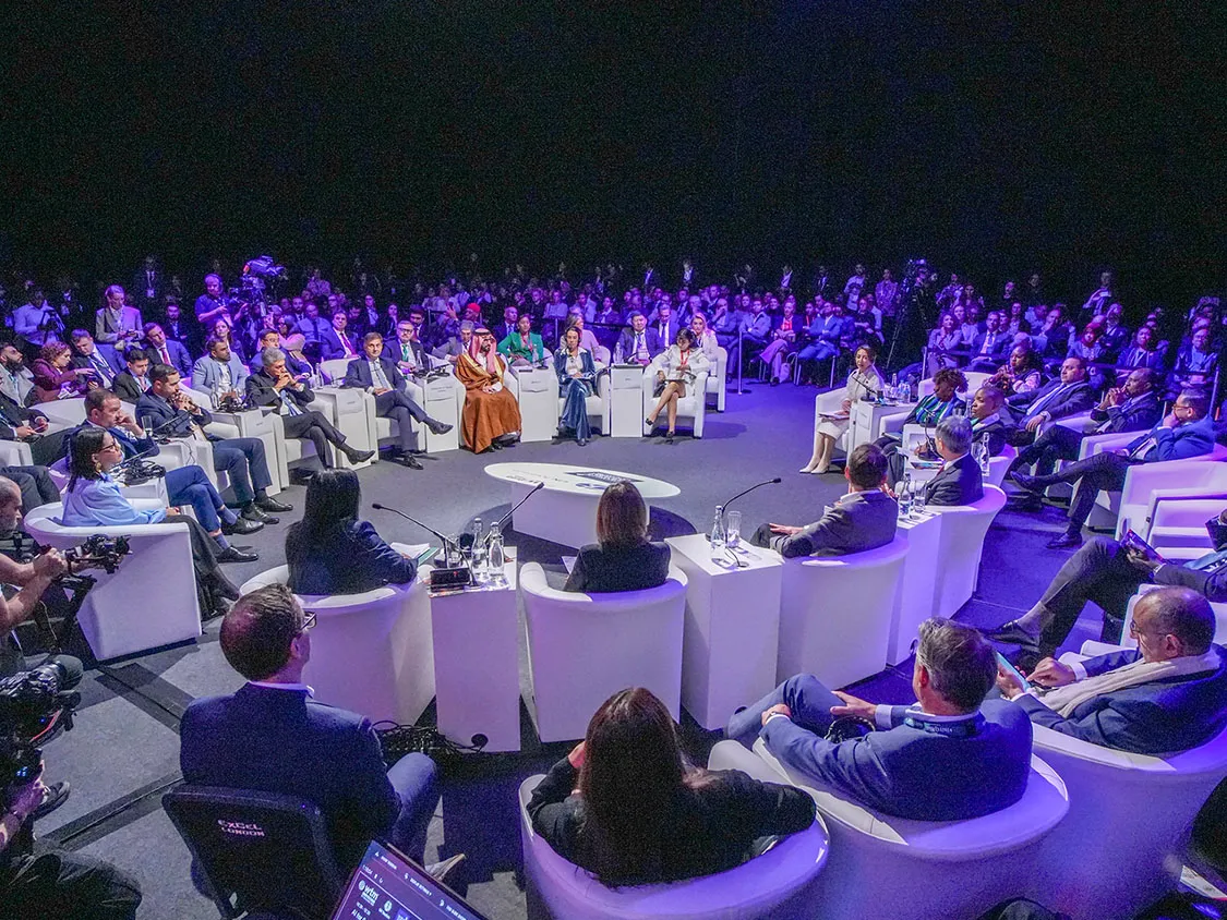 people in a round table discussion event 
